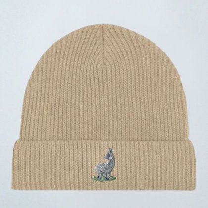 Caritas Schenken mit Sinn Haube beige mit Stickemblem Esel