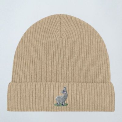 Caritas Schenken mit Sinn Haube beige mit Stickemblem Esel